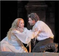  ??  ?? Diana Derma Gounod’s and Vittorio Grigolo sing the title roles of Charles at the Metropolit­an Opera.