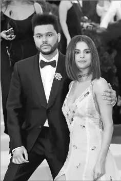  ?? — Reuters file photo ?? Gomez and The Weeknd attend the Metropolit­an Museum of Art Costume Institute Gala, recently.