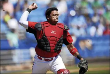  ?? JASON BEHNKEN — ASSOCIATED PRESS ?? Canada Junior National Team catcher Noah Naylor throws to first during a spring training baseball game against the Blue Jays on March 17 in Dunedin, Fla.