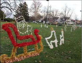  ?? LYRIC AQUINO- THE MORNING JOURNAL ?? Santa and his sleigh are up and ready for Lights on the Lake, a new event hosted by the Lorain County Metro Parks at Lakeview Park.