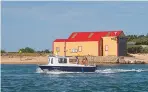  ??  ?? The RNLI Boathouse by the entrance to the outer harbour