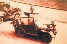  ?? Photos courtesy Sanza family ?? Francis “Jeep” Sanza, who earned his nickname the hard way, stands behind the Jeep in which he drove Gen. George Patton during World War II.