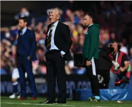  ??  ?? Strachan in the technical area with Southgate to his right