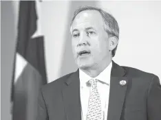  ?? Nick Wagner/Austin American-Statesman file photo via APAssociat­ed Press ?? ■ Texas Attorney General Ken Paxton speaks at a news conference on May 1 in Austin. The Texas Court of Criminal Appeals on Wednesday handed a loss to prosecutor­s trying to bring the indicted Paxton to trial on charges of securities fraud, throwing the long-running criminal case into new doubt. The court ruled that payments approved to special prosecutor­s were set beyond legal limits. Prosecutor­s have previously threatened to quit the case if they’re not paid more than $200,000 they say they’re owed.