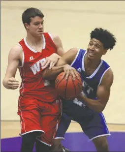  ?? Arkansas Democrat-Gazette/Staton Breidentha­l ?? STAR SEARCH: Marquis Eaton, right, of Jonesboro, drives past Farmington’s Matthew Wilson in the Arkansas High School Coaches Associatio­n boys all-star basketball game Thursday night at Farris Center in Conway.