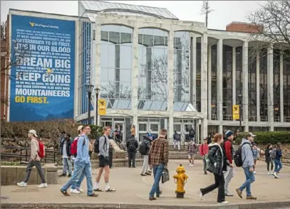  ?? Andrew Rush/Post-Gazette ?? The campus of West Virginia University in Morgantown, W.Va. The university has not required all to be vaccinated, but continues to strongly encourage it.