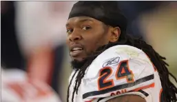  ?? Tribune News Service/getty Images file photo ?? Marion Barber (24) of the Chicago Bears looks on from the bench against the Denver Broncos at Sports Authority Field at Mile High in Denver.