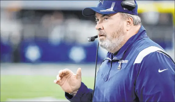  ?? Ron Jenkins The Associated Press ?? Dallas Cowboys coach Mike Mccarthy watches from the sideline during his team’s 43-3 win over the Atlanta Falcons on Sunday.