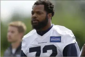  ?? ASSOCIATED PRESS FILE ?? Seahawks defensive end Michael Bennett walks off the field following a practice in Renton, Wash.