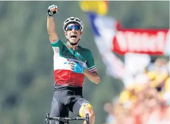  ?? EPA ?? Astana rider Fabio Aru celebrates as he crosses the finish line to win the fifth stage.