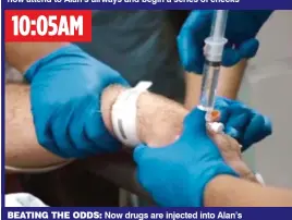  ??  ?? BEATING THE ODDS: Now drugs are injected into Alan’s arm to keep him sedated while staff monitor his vital signs