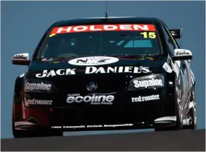  ??  ?? Taming an Aussie V8 Supercar took some skills during Collins’ spell