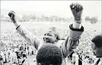  ?? PICTURE: LEON MULLER/AFRICAN NEWS AGENCY (ANA) ARCHIVE ?? Nelson Mandela acknowledg­es a thunderous welcome from more than 200 people in Worcester. Minutes later he delighted the crowd by saying in Afrikaans that he, too, was a Bolander having spent the last part of his life sentence in a prison warder’s home...