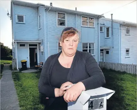  ?? Photo: MAARTEN HOLL/FAIRFAX NZ ?? Nowhere to go: Georgina Templeton, who has been unable to do her job since injuring her shoulder working for Spotless Services, is behind on the rent on her Strathmore state house. The family of eight have been issued with an eviction notice, but do...