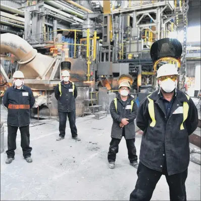  ?? PICTURE: ANDY WATSON ?? BACK AT WORK: Members of the production team at the reopened Normanton Steel Plant, in Teesside.