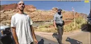  ?? MOAB POLICE DEPARTMENT VIA AP ?? An image from an Aug. 12 video provided by the Moab Police Department in Utah shows Brian Laundrie talking to an officer after police pulled over the van he was traveling in with his girlfriend, Gabby Petito, near the entrance to Arches National Park.