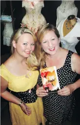  ??  ?? Wearing a replica Wedding Corset, Lace Embrace’s Melanie Talkington, left, welcomed Lily Heise, whose books detail 17 years of seeking romance in Paris.