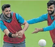  ?? Picture: PAUL ELLIS/AFP ?? QUARANTINE PERIOD: Pakistan’s Imad Wasim, left, and Shadab Khan during a training session at Edgbaston last year. Pakistan’s Test and Twenty20 squads will arrive in England in July, almost a month before their first Test during the pandemic to undergo a two-week quarantine period