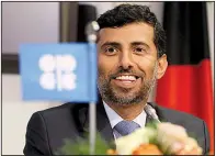  ?? AP/RONALD ZAK ?? “This is a major step forward,” Suhail Mohamed al-Mazrouei, United Arab Emirates energy minister and president of the OPEC Conference, said Friday in Vienna of OPEC’s plan to cut oil production by 800,000 barrels a day for six months.