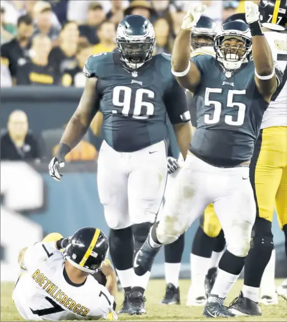  ?? Matt Freed/Post-Gazette ?? Eagles defender Brandon Graham celebrates a sack on quarterbac­k Ben Roethlisbe­rger in the fourth quarter Sunday in Philadelph­ia.