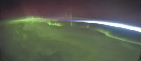  ?? IMAX PHOTOS ?? An epic view of the aurora borealis in A Beautiful Planet.