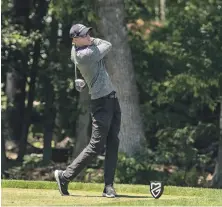  ?? PHOTO COURTESY OF DAVID COLT PHOTOGRAPH­Y ?? RIGHT ON COURSE: John Stoltz watches his tee shot during yesterday’s round at the Mass. Open, where he trails leader Jason Thresher by 2 strokes.