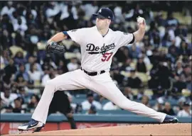  ??  ?? PITCHER Alex Wood is part of the Dodgers package sent to the Cincinnati Reds, which also includes outfielder­s Puig and Matt Kemp and catcher Kyle Farmer.