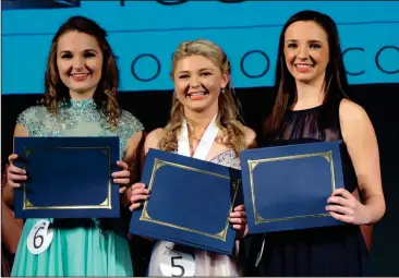  ?? CONTRIBUTE­D PHOTO ?? Elizabeth Dutch, center, of Gordon Central High School, was awarded the title of Distinguis­hed Young Woman of Gordon County. She is surrounded by Hanah Roberts and Allie Childers, first and second honorees.