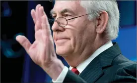  ?? The Associated Press ?? Secretary of State Rex Tillerson waves goodbye after speaking at the State Department in Washington on Tuesday. Tillerson was fired by U.S. President Donald Trump.