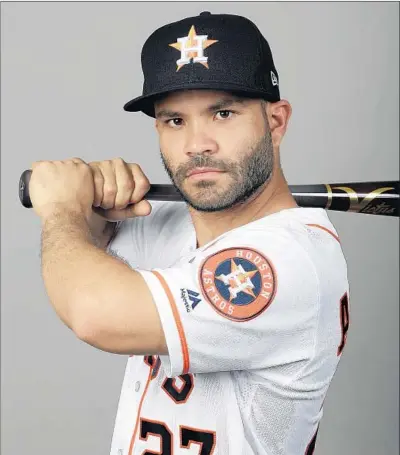  ?? John Raoux Associated Press ?? HOUSTON ASTROS second baseman Jose Altuve is coming off a most-valuable-player season in which he led the majors with a .346 batting average, good for his second American League batting title in a row and third in the last four seasons.