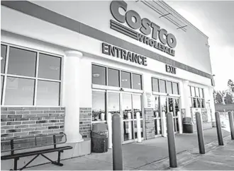  ?? Seattle Times / Dreamstime / TNS ?? Even as Costco’s sales and profits surge, the retailer is looking to contend with online sellers and draw millennial customers into its brick-and-mortar stores.