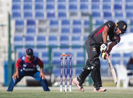  ?? AFP ?? Ghulam Shabbir built on a good platform and ensured UAE’s victory with a knock of 81 not out against Nepal in Abu Dhabi