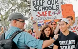  ?? — AP ?? Student survivors from Marjory Stoneman Douglas High School arrive at a rally for gun control reform in Tallahasse­e, Florida, on Thursday.