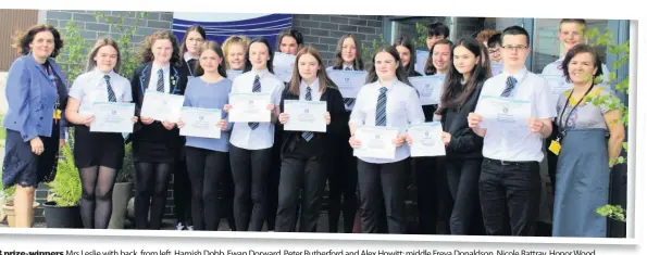  ??  ?? prize-winners Mrs Leslie with back, from left, Hamish Dobb, Ewan Dorward, Peter Rutherford and Alex Howitt; middle Freya Donaldson, Nicole Rattray, Honor Wood, e Spackman, Erin Douglas, Beth Appleton and Ruth Watson, and, front, Kaitlyn MacKinnon, Ruby Simpson, Imogen Pengilley, Zoe Davidson, Aimee McCulley, Lucy peland, Chloe McAnearney and Ross Annan, with acting depute head Eleanor Rutherford