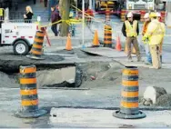  ?? PAT MCGRATH/OTTAWA CITIZEN ?? Sinkholes like this one are symptomati­c of the need for a larger investment in new infrastruc­ture and repair of old facilities.