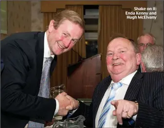  ??  ?? Shake on it: Enda Kenny and Hugh McElvany