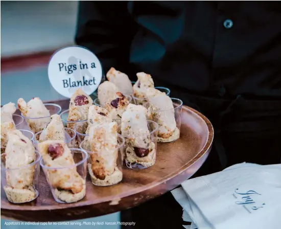  ?? Photo by Heidi Hanson Photograph­y ?? Appetizers in individual cups for no- contact serving.