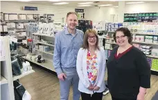  ?? PHOTOS: ERIN PETROW ?? Schaan Home Healthcare president and CEO Collin Schaan, left, with product specialist­s Terry Heard and Tam Gunn.