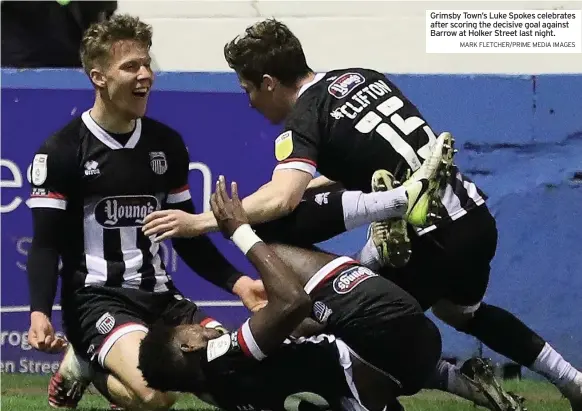  ?? MARK FLETCHER/PRIME MEDIA IMAGES ?? Grimsby Town’s Luke Spokes celebrates after scoring the decisive goal against Barrow at Holker Street last night.