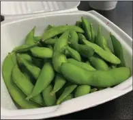  ?? (Arkansas Democrat-Gazette/Eric E. Harrison) ?? There’s very little salt on Bamboo Hibachi’s edamame.