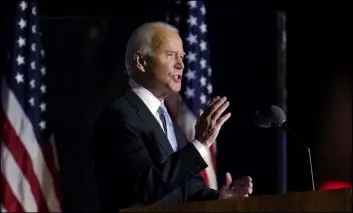  ?? Paul Sancya The Associated Press ?? President-elect Joe Biden speaks Saturday in Wilmington, Del. After numerous unsuccessf­ul attempts at the presidency, Biden found the timing finally right in 2020.