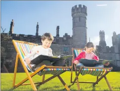  ?? (Photo: Patrick Browne) ?? Helping to launch the 2022 Towers and Tales Children’s Book Festival at Lismore Castle are twins Hugo and Hannah Trigg, age 8, from Lismore. The festival will take place in person at Lismore Castle on Saturday, April 30th.