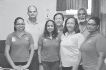  ?? (GINA photo) ?? From left to right at back are ophthalmol­ogists Dr. Rishi Sharma, Dr. Terrence Allan and Dr. Deo Singh. Front row are ophthalmol­ogical technician­s Savitri Roopnarain­e, Sasha Hosein, Dr. Sonja Johnston, ophthalmol­ogist and ophthalmol­ogical technician...