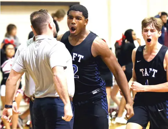  ?? ALLEN CUNNINGHAM/FOR THE SUN-TIMES ?? Taft’s Dexter Stigall (12 points, five rebounds) celebrates the Eagles’ come-from-behind victory against Von Steuben on Wednesday.