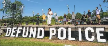  ?? JERRY HOLT AP ?? Alondra Cano, a Minneapoli­s City Council member, speaks in June in Minneapoli­s. The Minneapoli­s City Council was set to decide whether to shrink the city’s Police Department Wednesday.