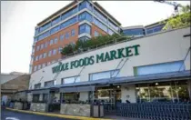  ?? DREW ANTHONY SMITH, GETTY IMAGES ?? Amazon announced Friday it is buying Whole Food Markets for $13.7 billion.