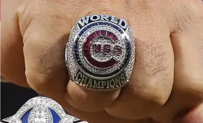  ?? JONATHAN DANIEL/ GETTY IMAGES ( CUBS), JOSTENS ?? The Cubs’World Series ring, as displayed by Jed Hoyer, and an up- close look at the Patriots’ latest Super Bowl ring.