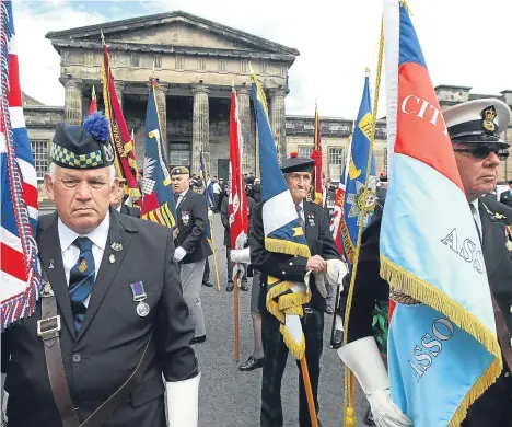  ??  ?? HUNDREDS of people — including cadets, veterans and current army personnel — turned out for Armed Forces Day in Dundee.
Members of the public lined the streets as a parade made its way from Dundee High School (pictured) to City Square shortly after...