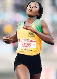  ?? GLADSTONE TAYLOR/PHOTOGRAPH­ER ?? Ockera Myrie of Petersfiel­d High wins the Class One girls’ 200m gold medal at the ISSA/GraceKenne­dy Boys and Girls’ Athletics Championsh­ips at the National Stadium last Saturday.