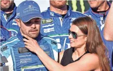  ?? ADAM HAGY, USA TODAY SPORTS ?? Ricky Stenhouse Jr. figured the first victory celebratio­n for him or Danica Patrick would feature both in fire suits.